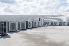 Air compressor on rooftop building